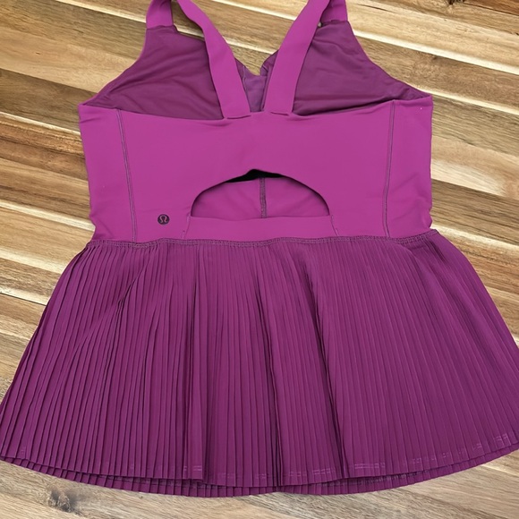 Pink peplum lululemon tank top. Buit in bra. Size 8 - Picture 2 of 2